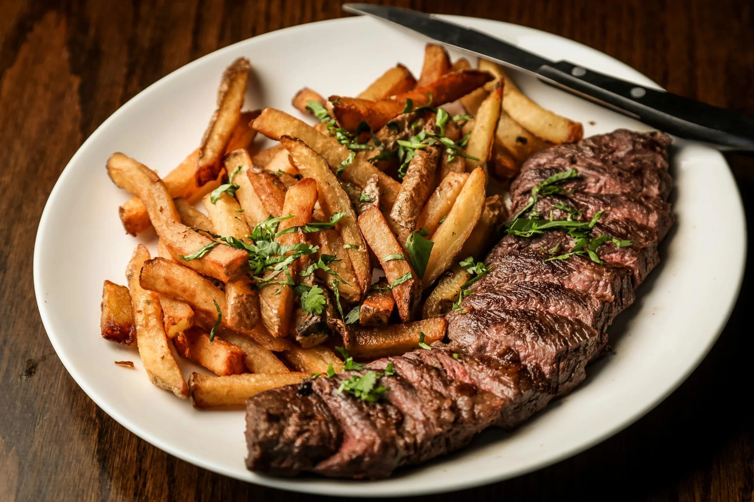 Steak and hand-cut fries served family style